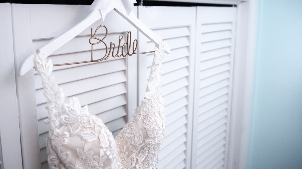 brides dress hanging up