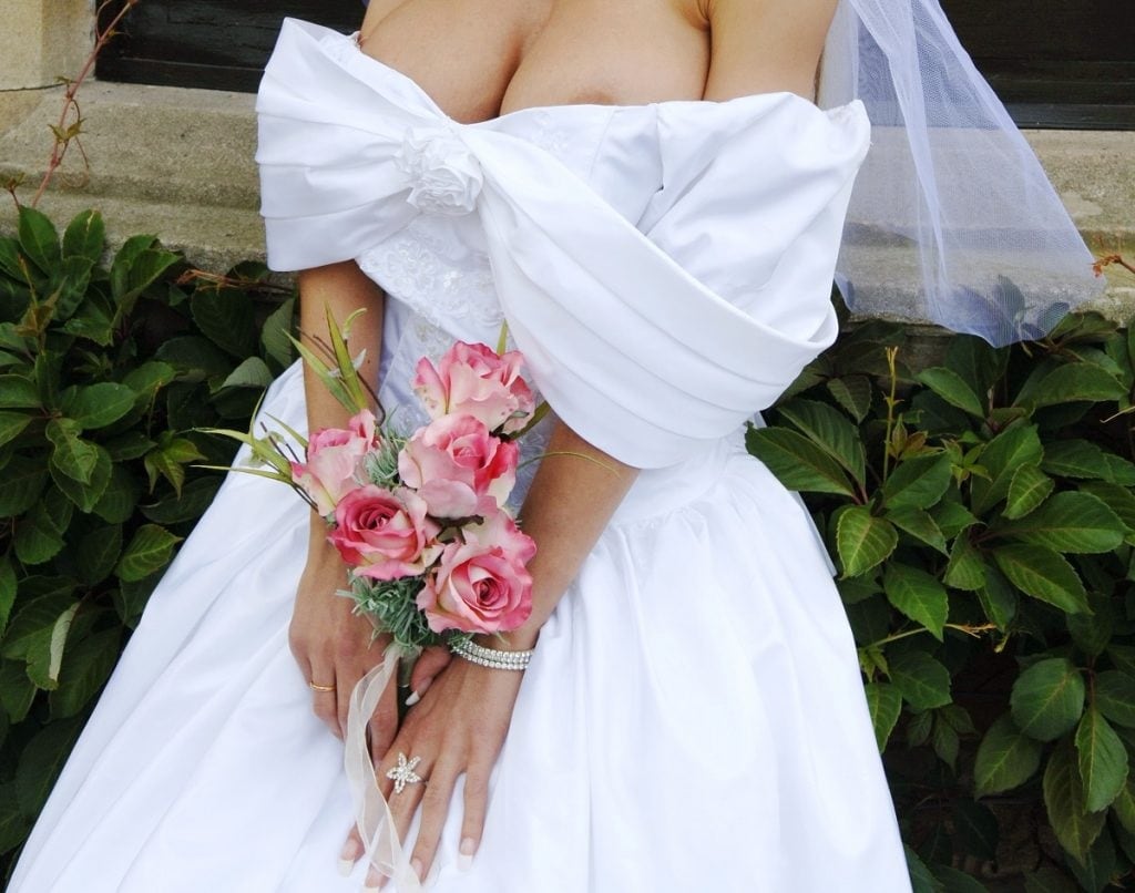 posing in wedding dress